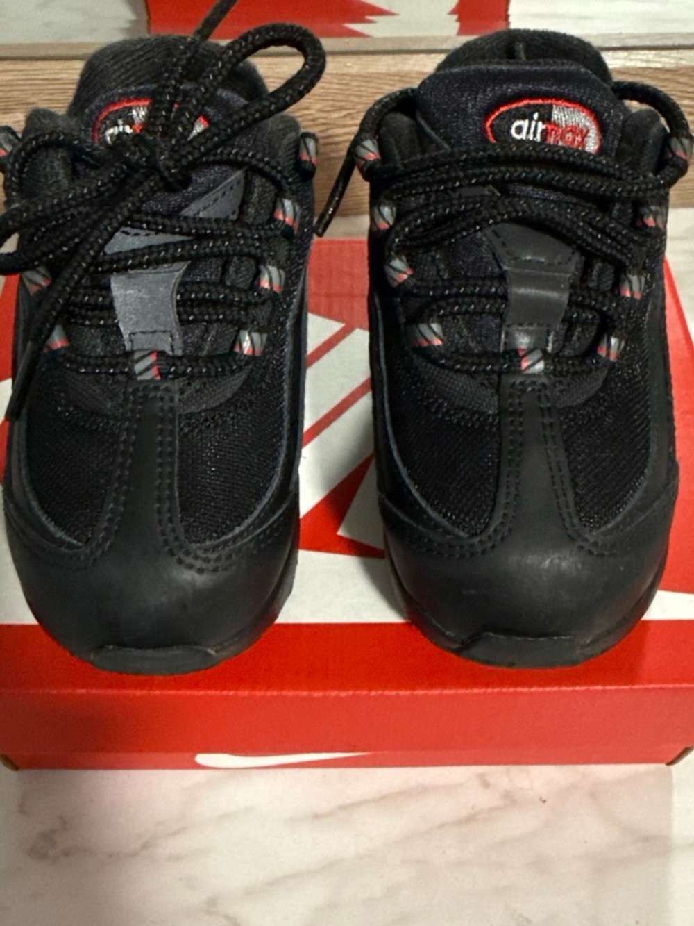 Nike Kids Black Sneakers with Red Accents